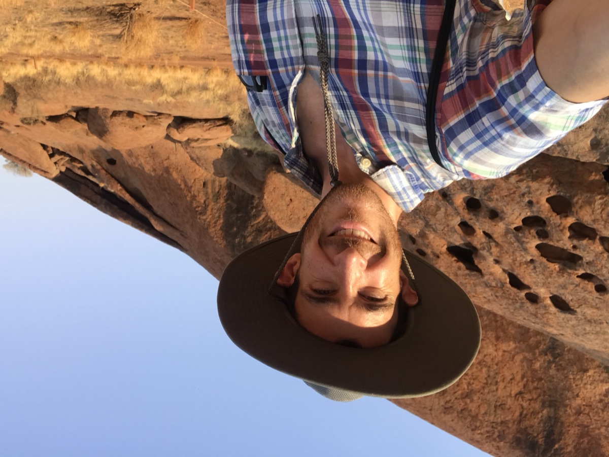 At Kata Tjuta in the Australian outback, bush hat