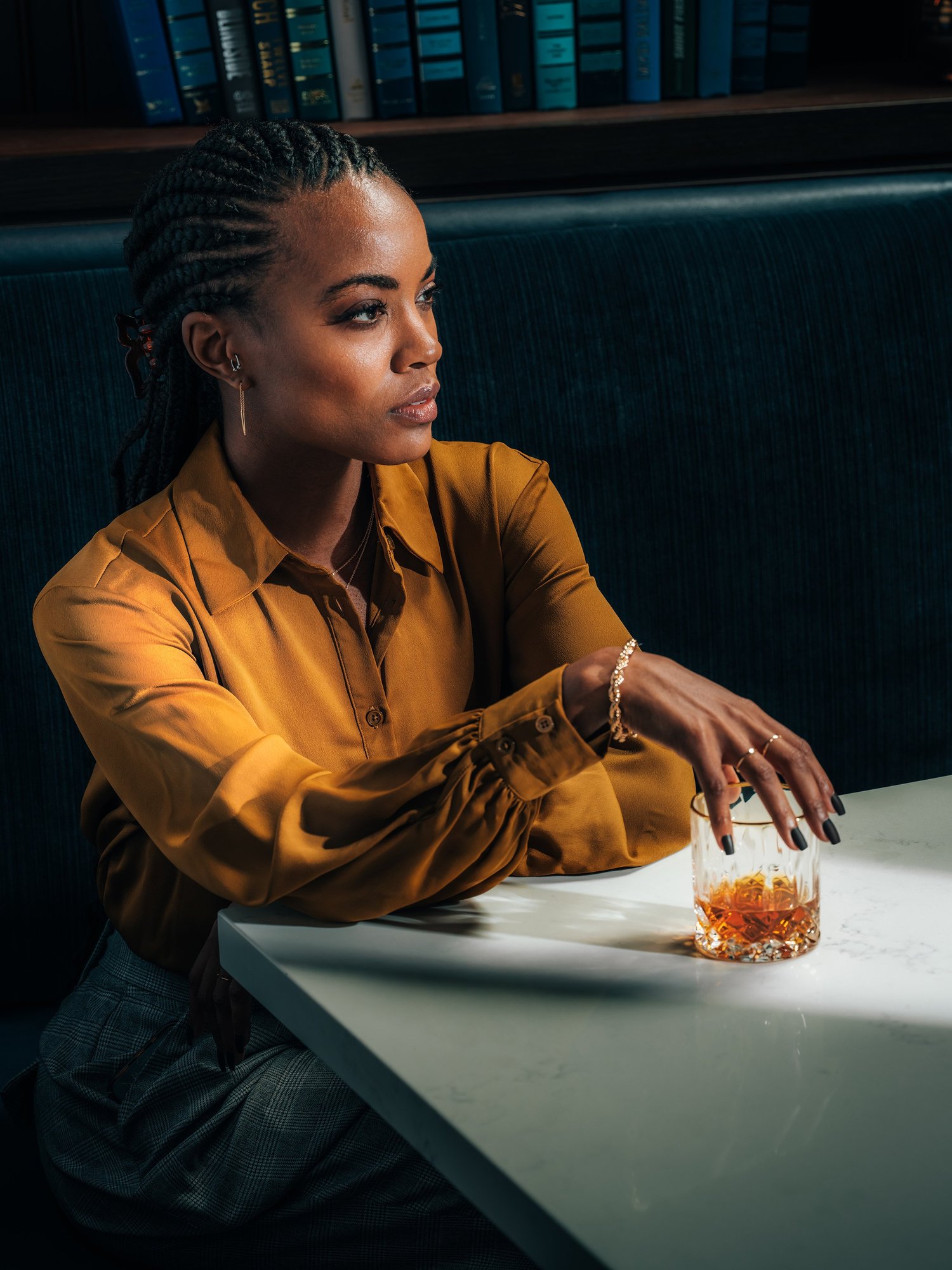 Campaign photography — whiskey drinker at the bar